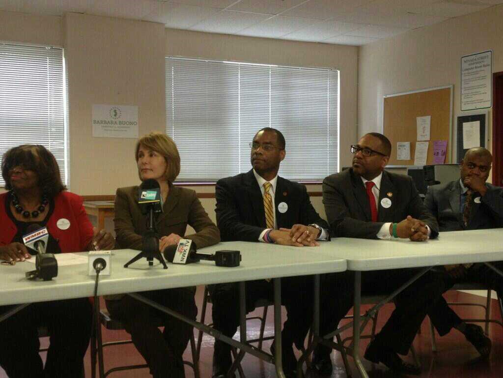 Ronald C. Rice at a press table endorsing State Senator Barbara Buono for Governor, 2013