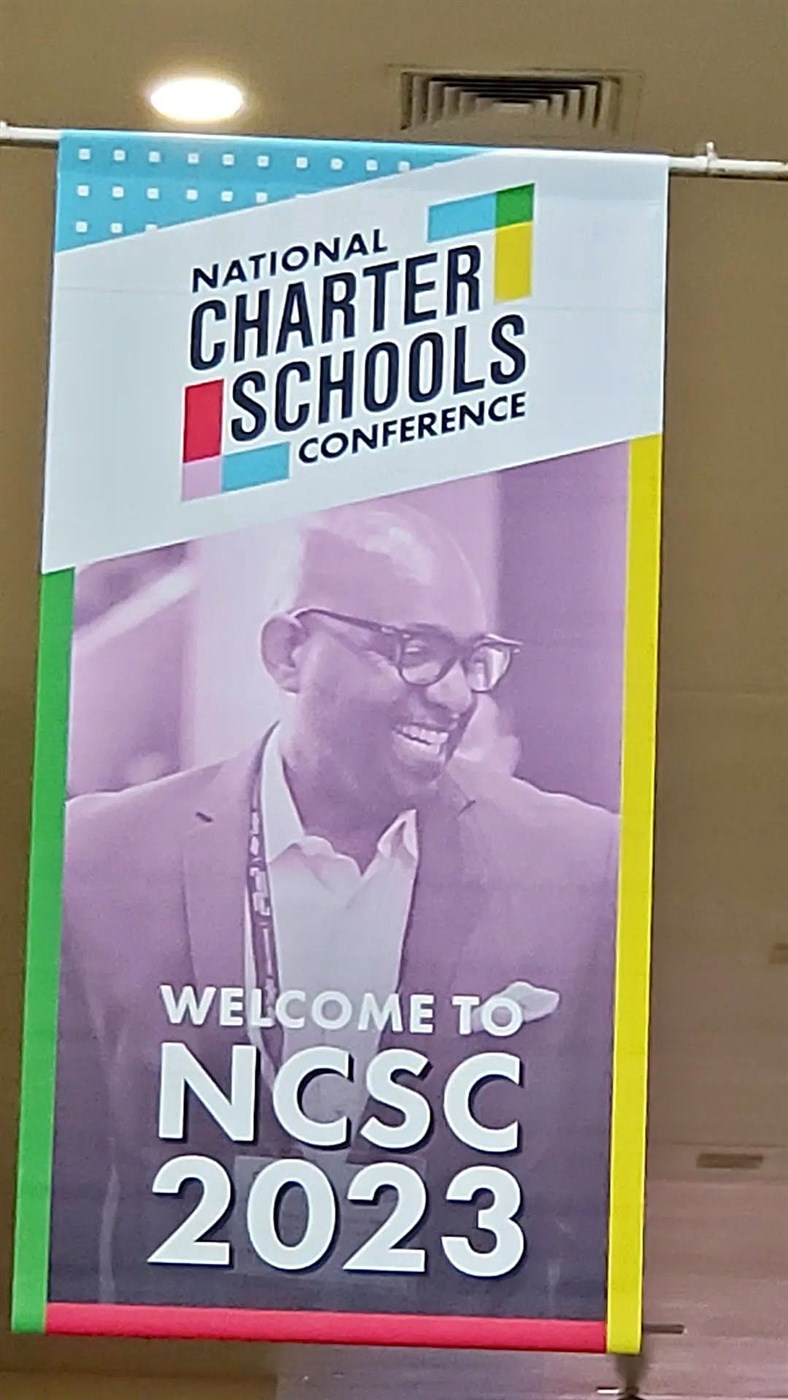 A National Charter Schools Conference 2023 welcome banner featuring Ronald C. Rice
