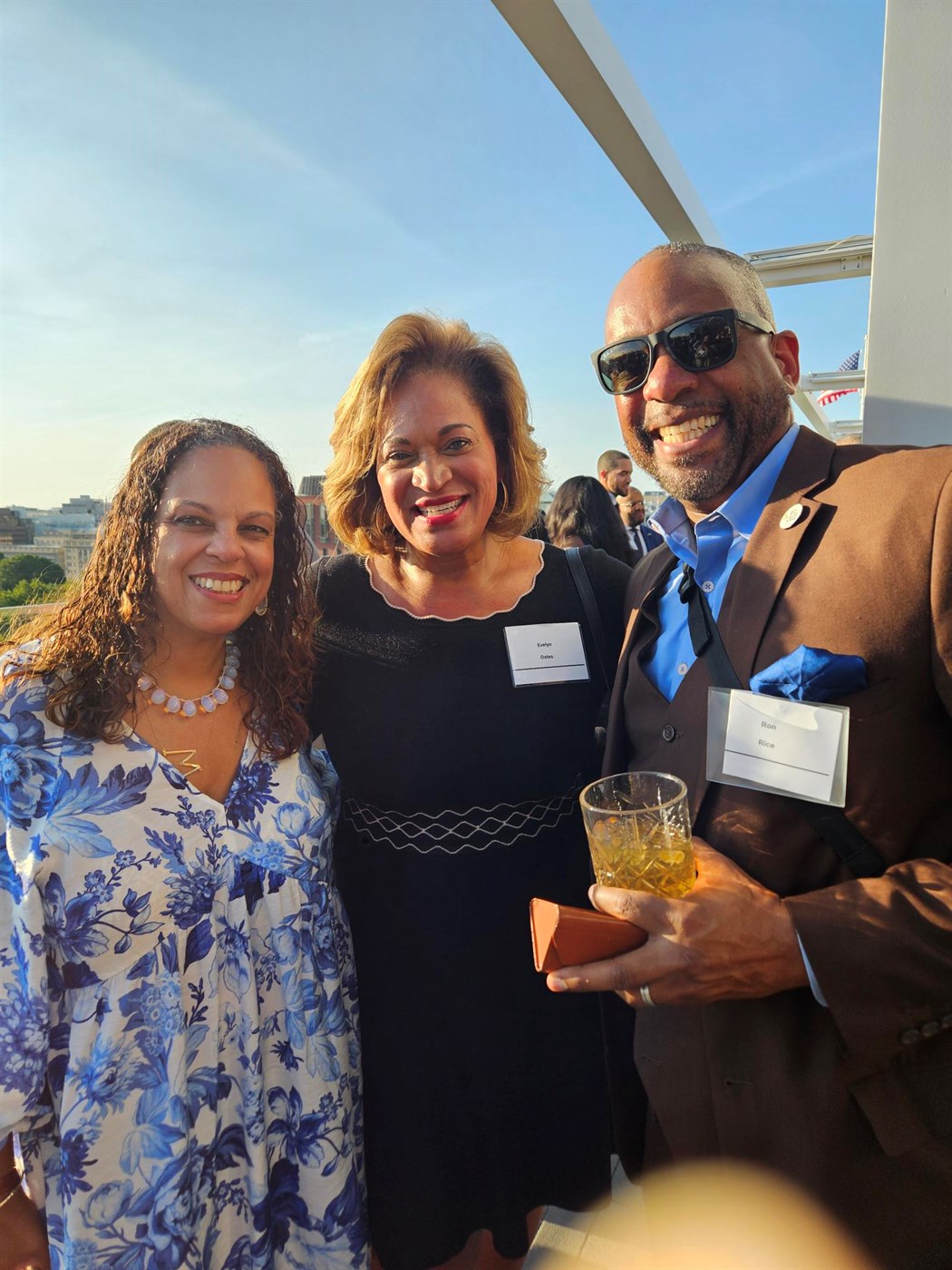 Ronald C. Rice with Evelyn Sample-Oates and a guest at a reception
