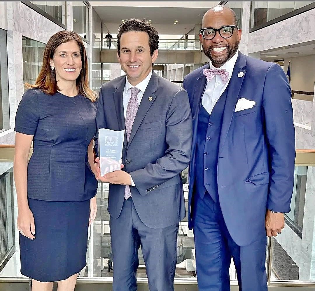 Ronald C. Rice with Senator Brian Schatz and a colleague in a Senate office building atrium